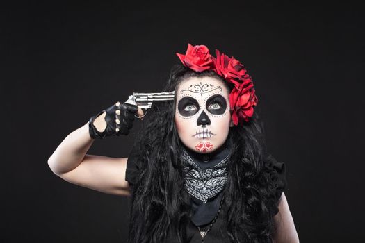 Young woman wearing with roses dressed up for All Souls Day