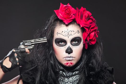 Young woman wearing with roses dressed up for All Souls Day