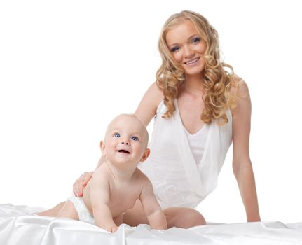 Beauty woman smile with son look up on bed isolated