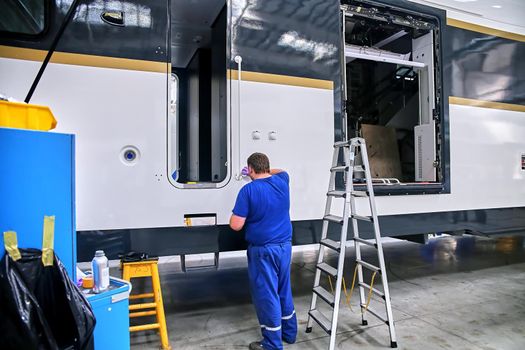 Inside the carriage assembly plant. Production workshop for the production of high-speed trains. Plant for the manufacture of rolling stock of trains.