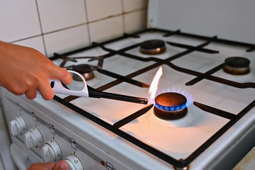 Gas stove for cooking in the kitchen. Gas crisis in Europe - high energy prices and stoppage of gas supplies. Russian war in Ukraine.