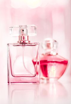 Perfume bottles on glamour background, floral feminine scent, fragrance and eau de parfum as luxury holiday gift, cosmetic and beauty brand present concept