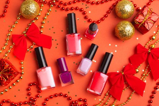 Nail polish in a New Year 's layout . New Year's gift cosmetics. The layout of the new year. A holiday gift.