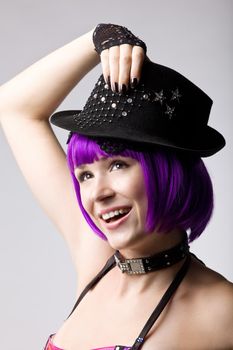 Beauty disco girl with pinc hair in hat