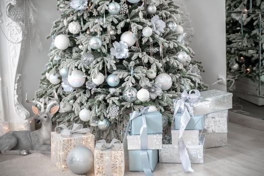 Presents and Gifts under Christmas Tree, Winter Holiday Concept.