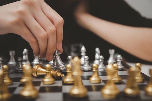 cute young girl playing chess using her mind.