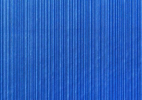 Blue abstract striped pattern wallpaper background, paper texture with vertical lines.