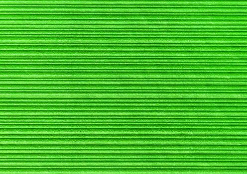 Green abstract striped pattern wallpaper background, paper texture with horizontal lines.
