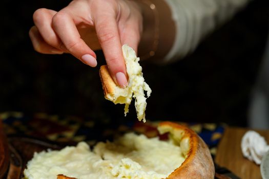 Freshly baked khachapuri in Adjara. Georgian cuisine.