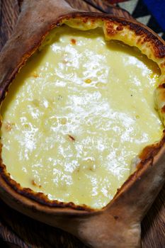 Freshly baked khachapuri in Adjara. Georgian cuisine.