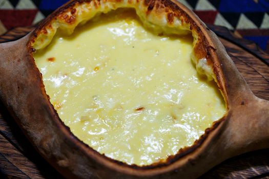 Freshly baked khachapuri in Adjara. Georgian cuisine.