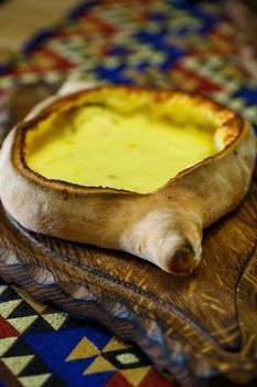 Freshly baked khachapuri in Adjara. Georgian cuisine.