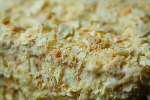 homemade Napoleon cake with cream on a gray background