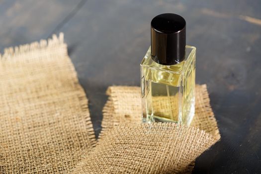 perfume bottle with black cap. Nice smell for women