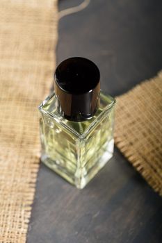 perfume bottle with black cap. Nice smell for women