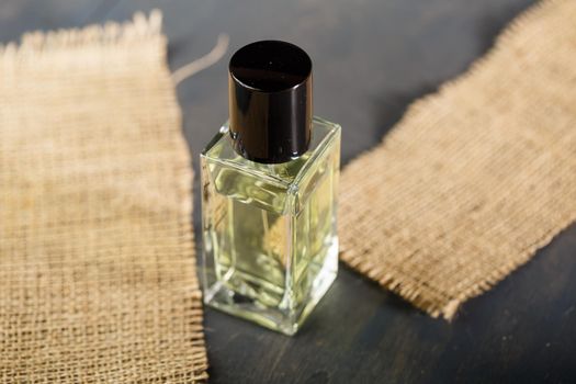 perfume bottle with black cap. Nice smell for women