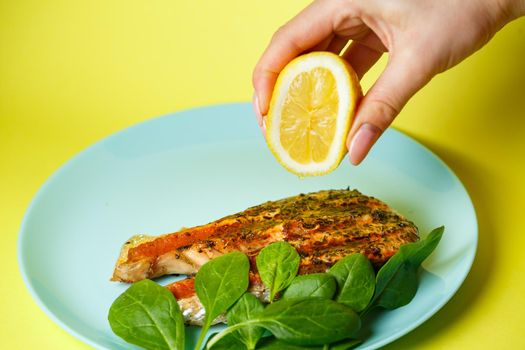 grilled salmon steaks until golden brown with spices and lemon juice