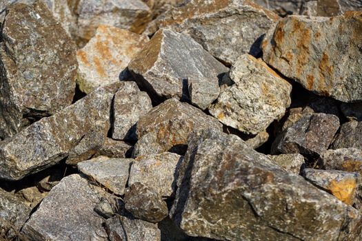 large natural stones piled up in the bright sun