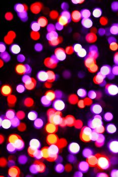 Abstract image of a Christmas tree made of electric lights.