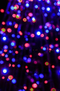 Multicolor bokeh circle background. Decorations made of LED blue lights during the holiday season.