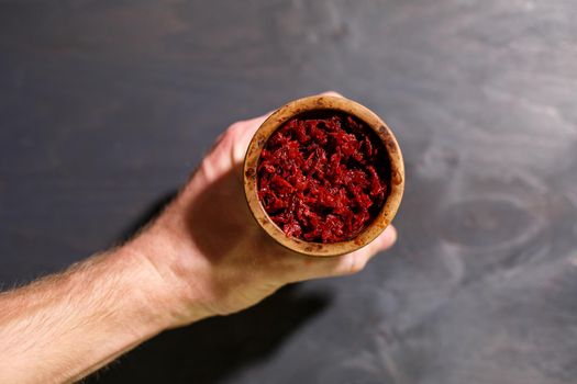 Tobacco for hookah in a clay bowl