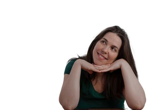 young long haired brunette girl with hand on her face looking at the horizon pensive isolated on white background