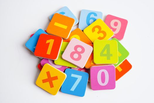 Number wood block cubes for learning Mathematic, education math concept.