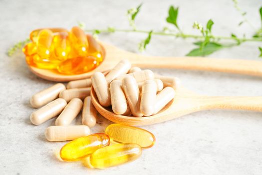 Alternative medicine herbal organic capsule with vitamin E omega 3 fish oil, mineral, drug with herbs leaf natural supplements for healthy good life.