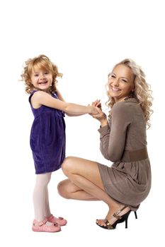 Happy mom and her daughter take hands smile isolated