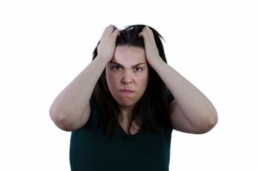 young brunette long haired girl pulling her hair angrily isolated on white background