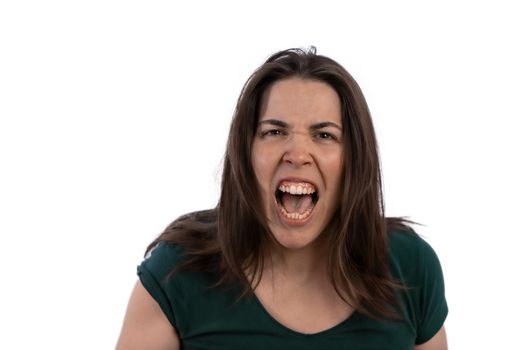 young brunette long haired girl screaming with open mouth angry face isolated on white background