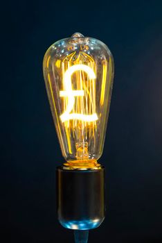 Money making idea. Light bulb with Pound sterling  symbol.