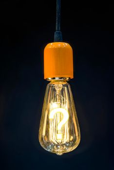 Bulb with glowing question mark inside of it, creativity concept