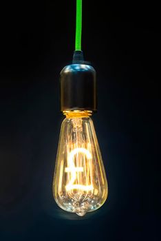 Money making idea. Light bulb with Pound sterling  symbol.