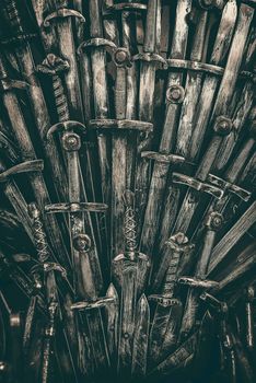 Metal knight swords background. Close up. The concept Knights.