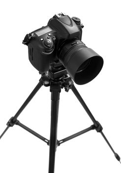 Photo camera on tripod isolated at white background