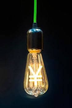 Money making idea. Light bulb with Japanese  Yen symbol.