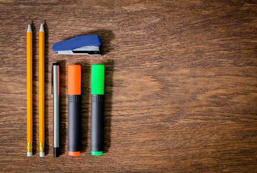 Pencils on an old wooden table table. close-up.