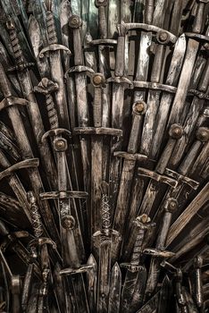 Metal knight swords background. Close up. The concept Knights.