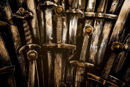 Metal knight swords background. Close up. The concept Knights.