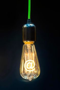 Bulb with glowing at mark inside of it, creativity concept
