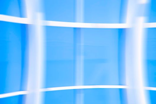 Geometric blue abstract background with triangles and lines.