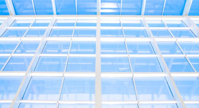 Geometric blue abstract background with triangles and lines.