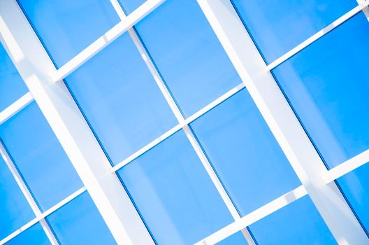 Geometric blue abstract background with triangles and lines.