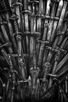 Metal knight swords background. Close up. The concept Knights.