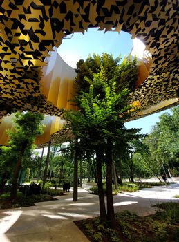 Budapest, Hungary - House of Hungarian music. Detail leafy tree in architecture.