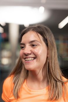 Portrait of a female trainee posing for the camera at the crossfit box