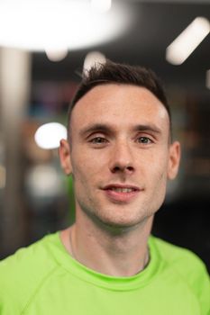 Portrait of a male trainee posing for the camera at the crossfit box