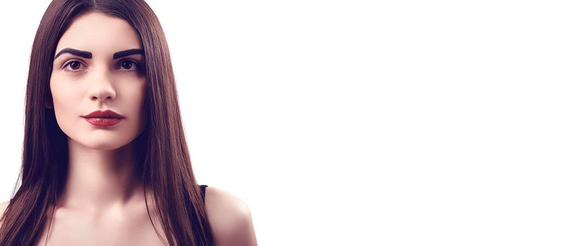 Portrait of nice young gorgeous woman on white backgrounds. To a lots of copy space.