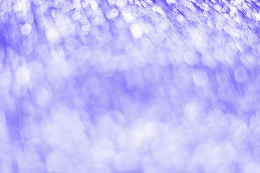 Violet bokeh. Abstract background. Defocused lights.